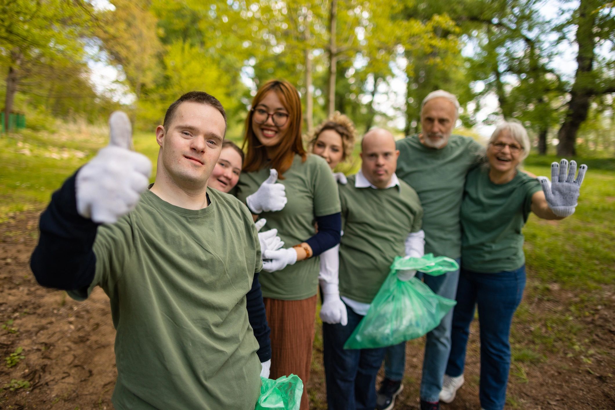 Church volunteers and families serving together outdoors
