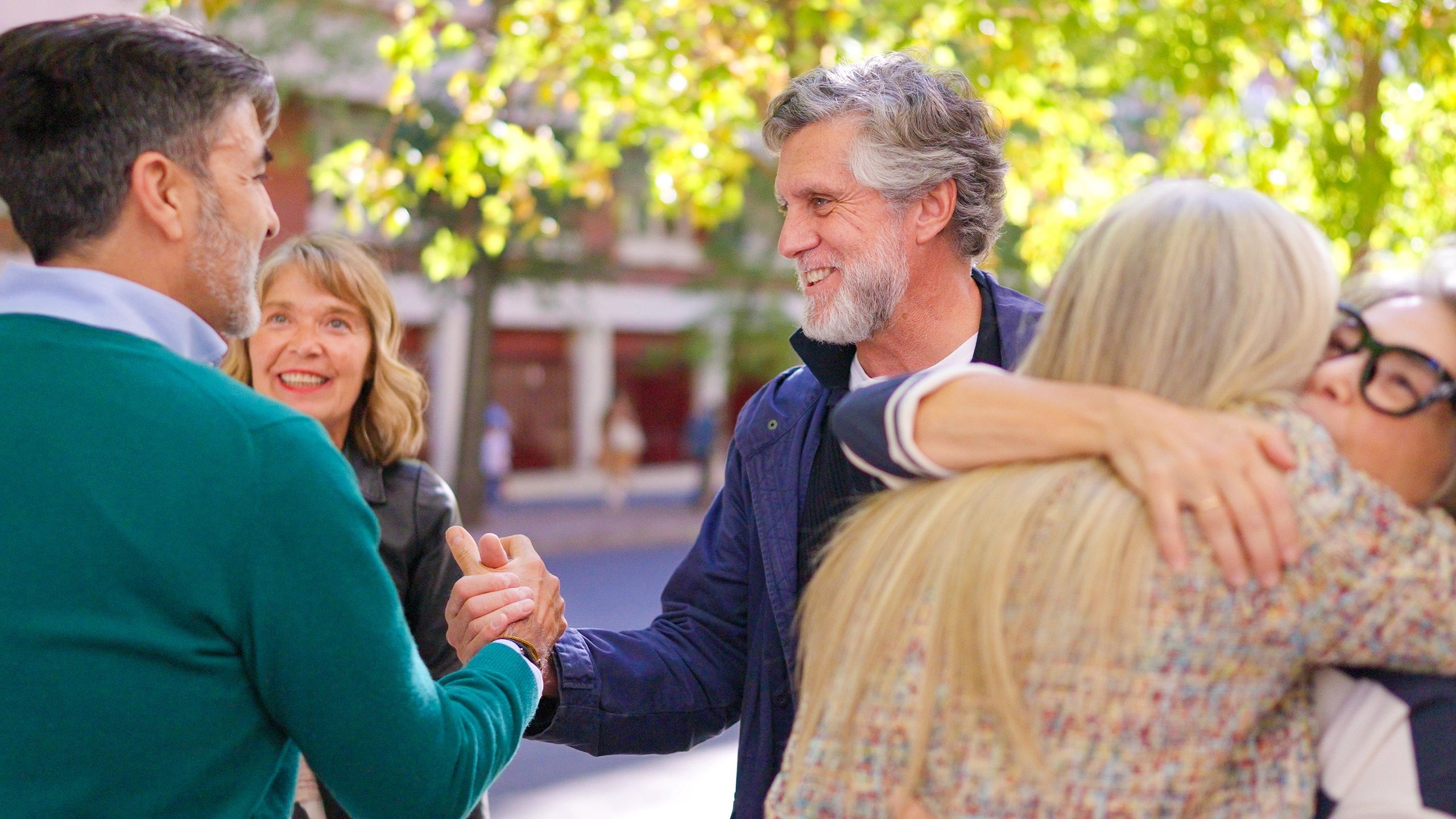 Church community members greeting one another warmly